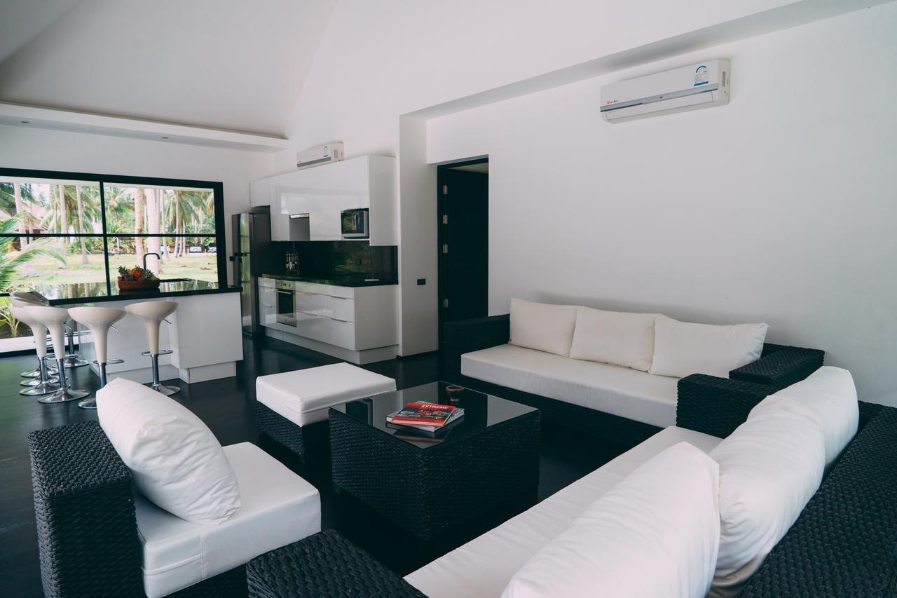 Le Motu Hotel Taling Ngam Beach Exterior foto