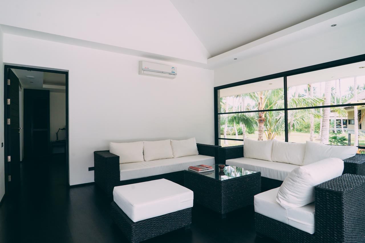 Le Motu Hotel Taling Ngam Beach Exterior foto